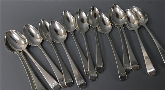 A harlequin set of fourteen George III silver Old English pattern dessert spoons, 13.5 oz.